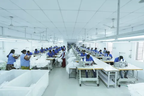 Weaving stage at BlueFashion textile unit